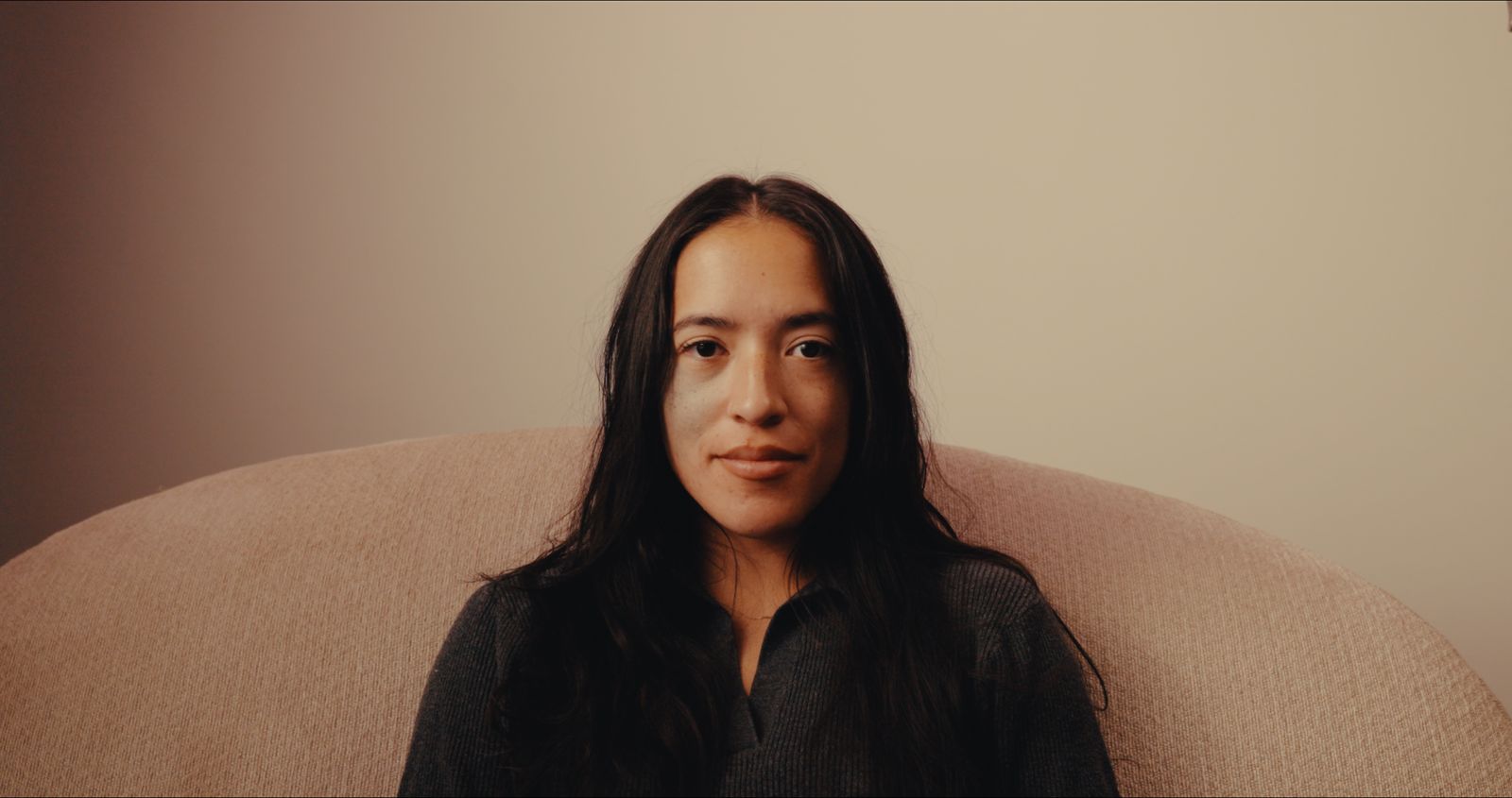 A woman in a warm studio portrait