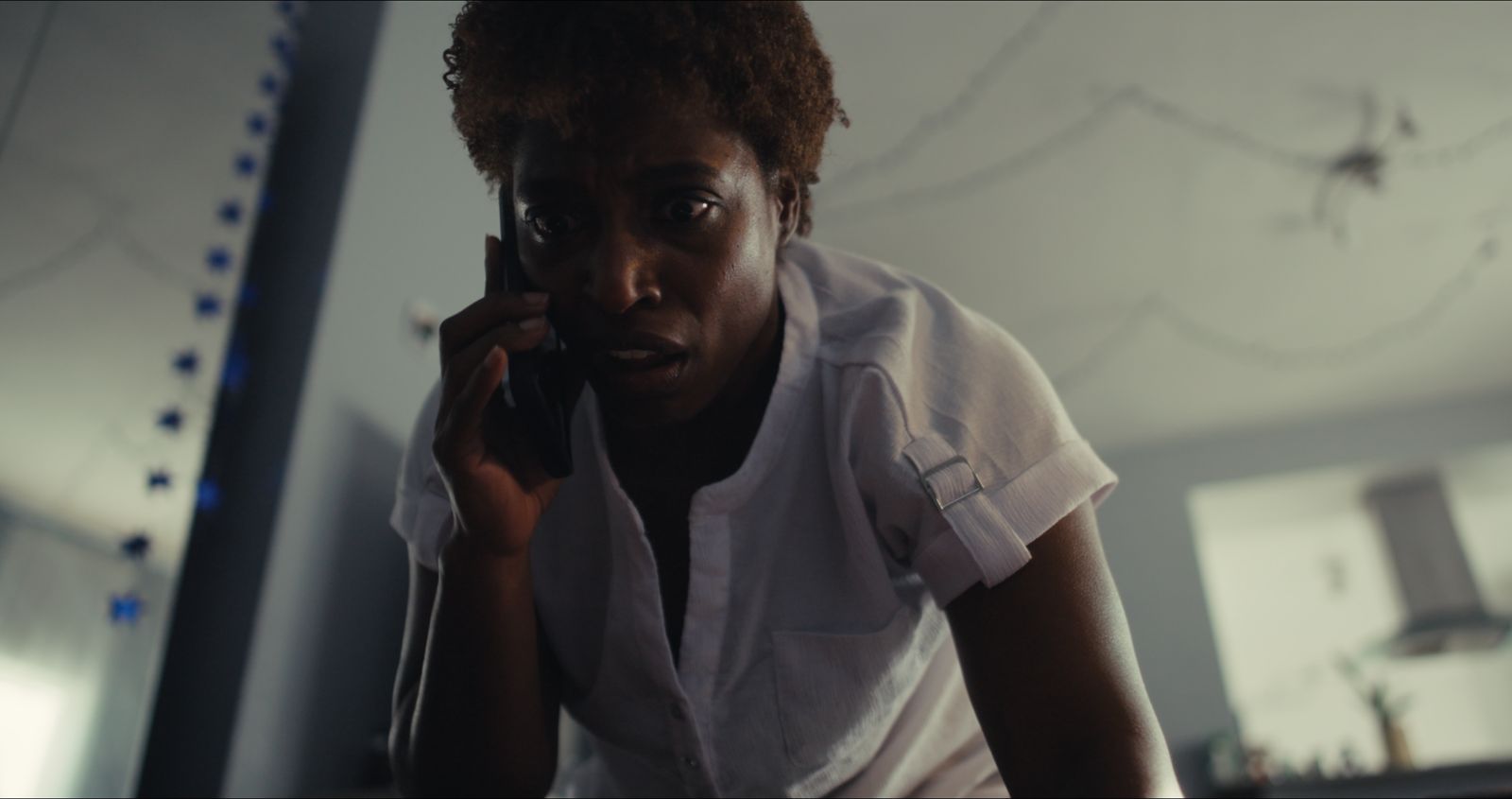 A woman on the phone in an office