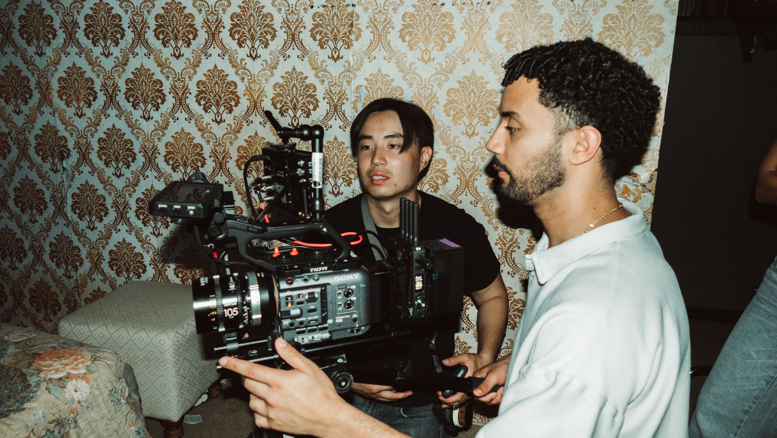 Josh Lopez and a camera operator on the set of Sundered