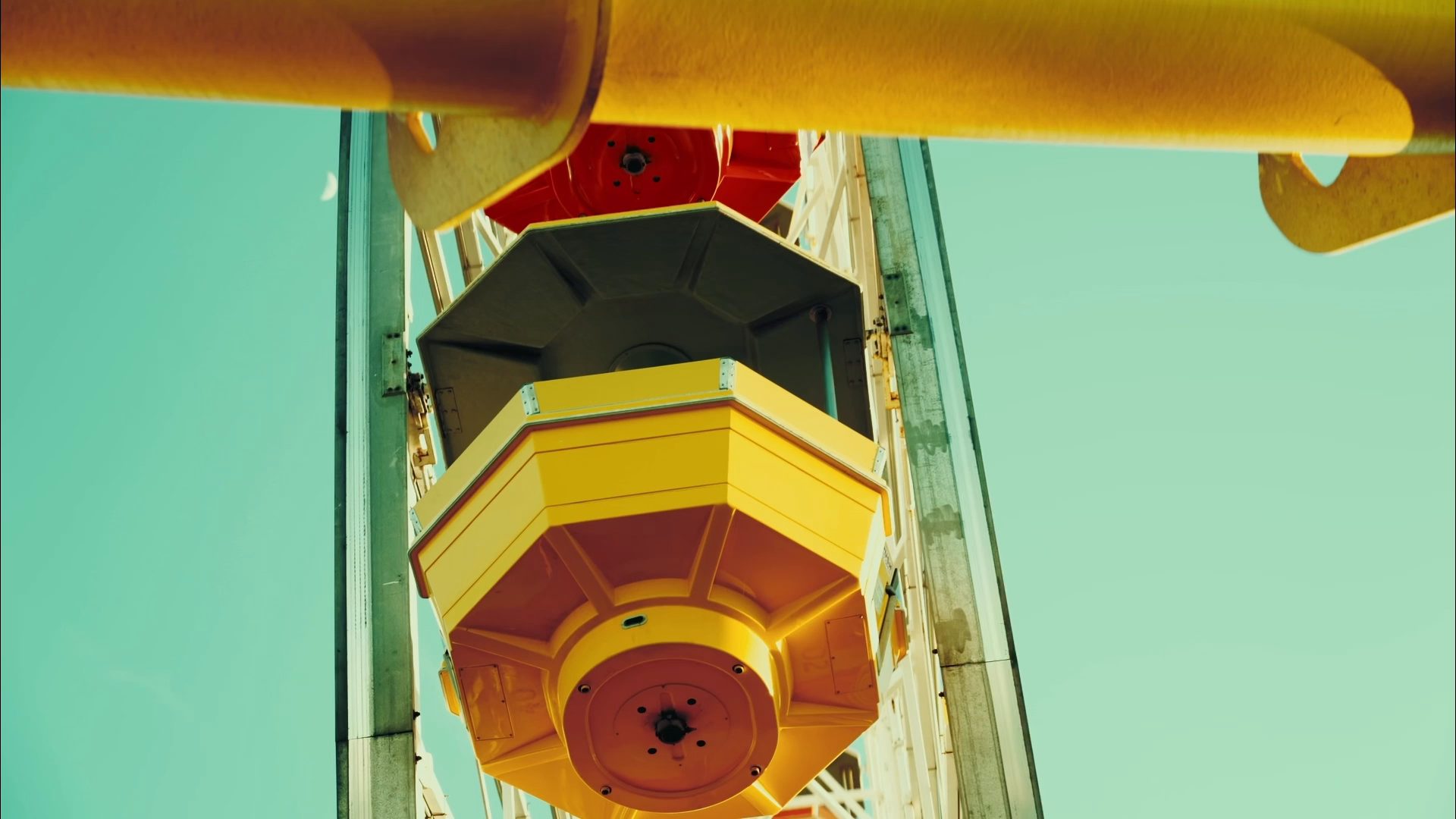Frame from the 2026 cinematography reel: a ferris wheel against a teal sky